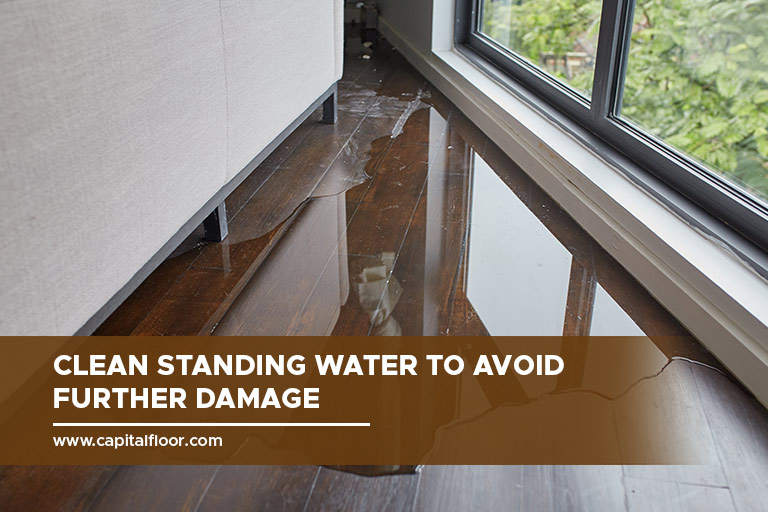 Clean standing water to avoid further damage