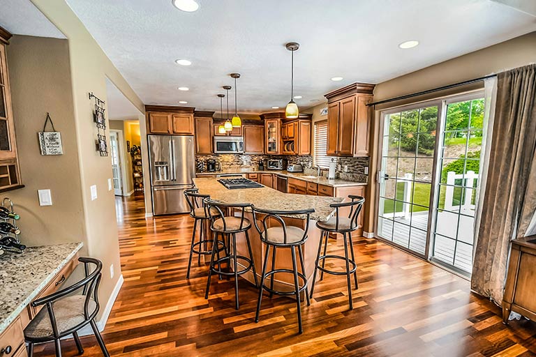 The Balanced Perspective: Hardwood Floors in Kitchen | Feature